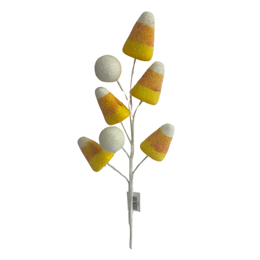 The 16.5" Candy Corn Spray 84446 adds a vibrant touch to a white branch.