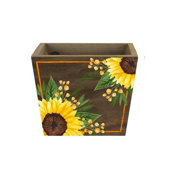 Add charm to your space with the 2 Asst 5.75Sqx4.25H Sunflower Planter in Yellow/Moss/Brown/Orange (KM1138), featuring hand-painted sunflowers, green leaves, and orange berries on a square box—choose from two assorted designs.