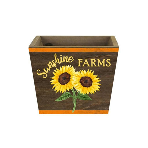 Brighten any space with the 2 Asst 5.75Sqx4.25H Sunflower Planter in yellow, moss, brown, and orange (KM1138), featuring “Sunshine Farms” and two painted sunflowers—perfect for adding rustic charm to your decor.