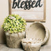 A set of three rustic pots includes one filled with green lavender and another with variegated plants. They are wrapped in textured fabric and twine, displayed on a wooden surface with a blessed wooden sign adding charm. These complement the Mini Tea Leaf Half Orb 02115orb.