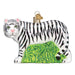The 12137 White Tiger Ornament by Old World Christmas features black stripes, green eyes, a pink nose, and stands on green grass with a gold hanging loop.