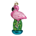 The Flamingo Ornament Old World Christmas 16023 showcases a glittery pink flamingo, gracefully balanced on one leg on a lush green cactus, complete with a gold hanging hook.