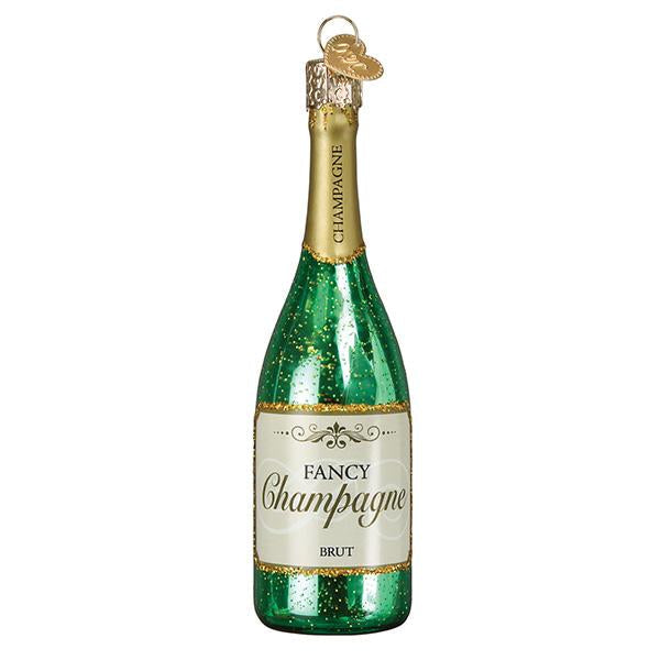 Add sparkle to your tree with the Champagne Bottle Old World Christmas Ornament 32440. This green and gold glass ornament features glitter accents, a gold foil top, and a gold hanging loop, capturing festive Champagne Brut style.