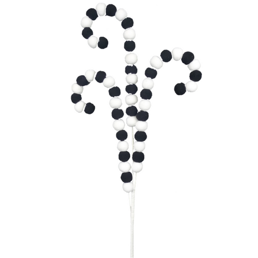The 28 Felt Ball Spray (62298SP28) features black and white pom-poms arranged in curled patterns, resembling stylized leaves or vines. The evenly spaced pom-poms create a playful and textured look.