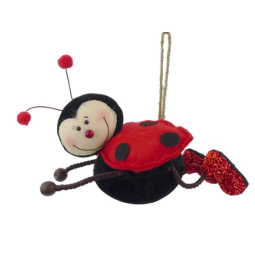 The 9 x 9 x 5 Ladybug Ornament (62789RD) features a cute smiling face, red antennae, a red polka-dotted shell, glittery red feet, and hangs by a string.