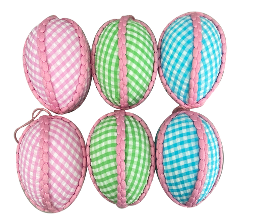 Six 4" fabric gingham egg ornaments from product 62994ASST are displayed in two rows. The top row has two pink and one green gingham-patterned ornaments, while the bottom row features two blue and one green gingham-patterned ornaments, each adorned with pink trim.