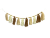 Product 85622CMBN: A 4-foot Cream and Brown Yarn Tassel Bead Garland features alternating beige and brown tassels, strung with small wooden beads, evenly spaced to give a festive rustic look against a black background.