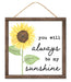 Brighten your space with the 10Sq You Will Always Be My Sunshine sign (White/Yellow/Green/Black/Brown, AP7250), featuring a painted sunflower and sweet message in script, framed in MDF and ready to hang with twine.