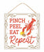 The 10 square Pinch Peel Eat Repeat Sign (AP7343) features a red lobster with corn and potato, adorned with the phrase in decorative fonts and ornate borders. Complete with a twine for hanging, it adds charm to any space.