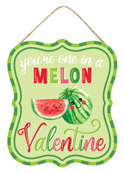 The 10.5Hx9L One In A Melon Valentine sign (AP7832) features a green and white polka dot background with playful text that says Youre one in a melon, Valentine. It includes a cute watermelon illustration with green stripes on durable MDF/Paper for lasting enjoyment.