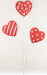 The 25"H Glitter Pattern Hearts Pick X3 in Red/White (HV026024) features three uniquely designed red and white glitter hearts on white sticks, displaying captivating animal print, stripes, and polka dots against a plain white background. Ideal for adding a sparkling touch to any setting.
