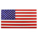 The 12L X 6.25H Metal/Embd American Flag (MD0603) features a blue field with 50 white stars on the upper left and 13 alternating red and white stripes.
