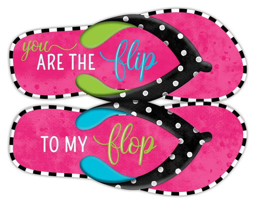 The 12.75Hx10L metal Flip To My Flops sign in black/white/pink/lime/turquoise features two pink flip-flops with black polka-dotted straps, a black and white checkered edge, and colorful text reading You are the flip on top and to my flop on the bottom. Its a whimsical home decor piece.