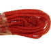 The Red PET Tinsel Flex Tubing RE354124 consists of shiny, textured red tinsel garland made from PET Polypropylene, loosely coiled and partially wrapped in clear plastic.