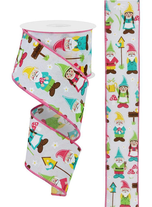 The 2.5X10YD RGE1196WT wired ribbon has a white background with pink edges, featuring colorful gnomes holding tools and near birdhouses and mushrooms, in various poses. The ribbon is displayed both looped and flat.