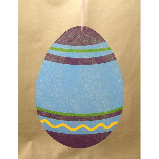 The 11.5 by 8.75 Blue Display Easter Egg (SG312-BLU) features a striking blue base with purple bands, green stripes, and a yellow wavy line, hanging elegantly against a brown background—perfect for your seasonal display.