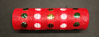 A Polka Dot Red-Green-White Woven Mesh, 10X10Y (XB108410-09), is wrapped around a cylindrical object and placed on a dark surface; the mesh features shiny red material with metallic white and green polka dots.