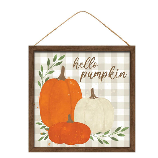 The 10\ Square Watercolor Hello Pumpkin Fall Sign AP7046 features three pumpkins—two orange, one white—on a light plaid background with green leaves. It hangs from a thin rope, framed in wood, and crafted from durable MDF for longevity.