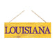The Purple Yellow Louisiana or Go Team Assorted Wall Hanging AP807899 is a rectangular MDF sign with a distressed yellow finish and rope hanger, prominently featuring LOUISIANA in bold purple letters.