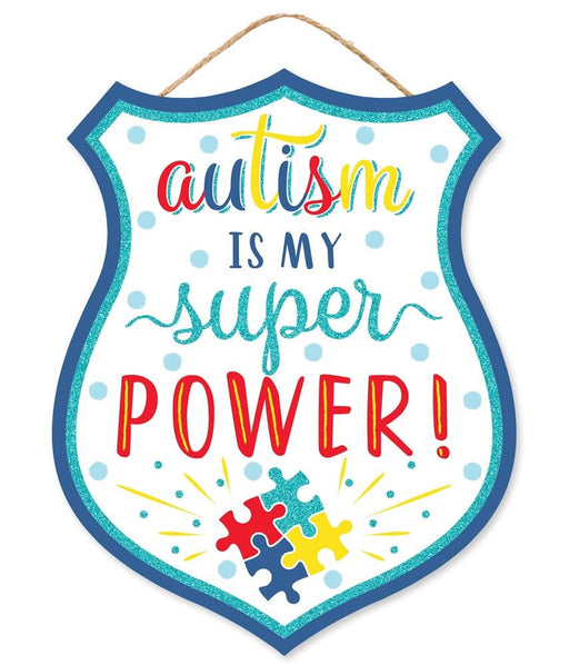The Autism/Super Power Badge (AP8918) features a shield-shaped sign with the vibrant message Autism is my super power! The words autism and power are highlighted, complemented by MDF puzzle pieces in red, blue, yellow, and green. Its bordered in blue with a rope for hanging.