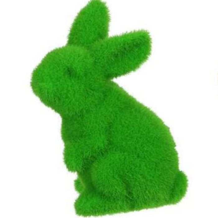 A 4Hx2.5L green, flocked standing rabbit figurine made from polystyrene sits upright, slightly right-facing, against a white backdrop (HE723899).