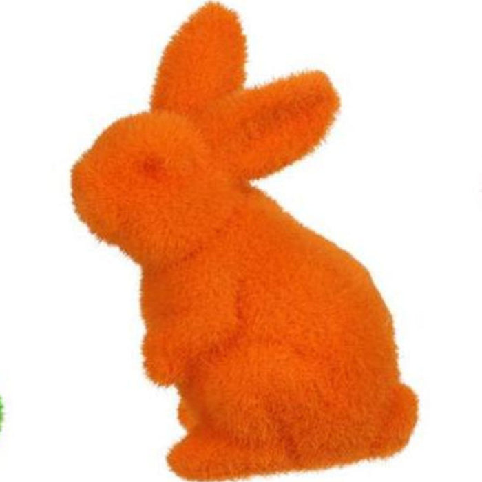 The 4Hx2.5L Flocked Standing Rabbit (HE723899) is a charming polystyrene figurine with a fluffy, orange texture, available in six captivating colors: purple, pink, black, green, turquoise, and yellow.