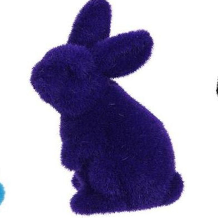 The 4Hx2.5L Flocked Standing Rabbit features a soft, fuzzy purple finish, standing upright with tall ears and a textured surface that mimics the delicate touch of nylon.