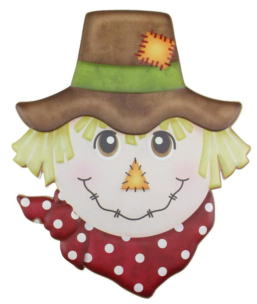 Illustration of a smiling 12H x 10L metal scarecrow face with straw hair, button eyes, a stitched nose and smile. It features a brown hat with a green band and patch and wears a red polka dot scarf.