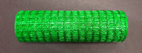 A tightly wound roll of Emerald Metallic Wide Weave Mesh, 10X10Y (XB104310-17), with a grid-like, wide weave pattern is placed horizontally on a dark, flat surface.