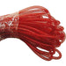 A coiled bundle of Red with Red Foil Deco Flex Tubing RE300436, sealed in plastic, displays its twisted strands and reflective texture, resembling exquisite holiday creations against a white background.