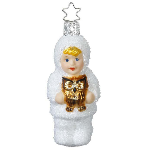 The Kinder of Forest Child with Owl Christmas Ornament (Inge-Glas 1-164-15) features a child in a fluffy white snowsuit holding a brown owl and topped with a silver star. Crafted from mouth-blown glass, its part of the exquisite Inge-Glas collection for timeless holiday elegance.