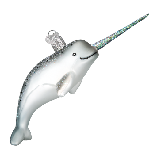 The Narwhal Whale 12538 Old World Christmas Ornament is a shimmering mouth-blown glass piece with a glittery tusk and hanging loop. This white and silver arctic sea-inspired narwhal, featuring a smiling expression, makes an ideal Christmas keepsake.