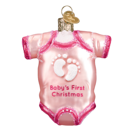 The Pink Baby Onsie Old World Christmas Ornament 32338 is hand-painted with glittery trim, white footprints, and the text Babys First Christmas. It features a gold cap on top for easy hanging.