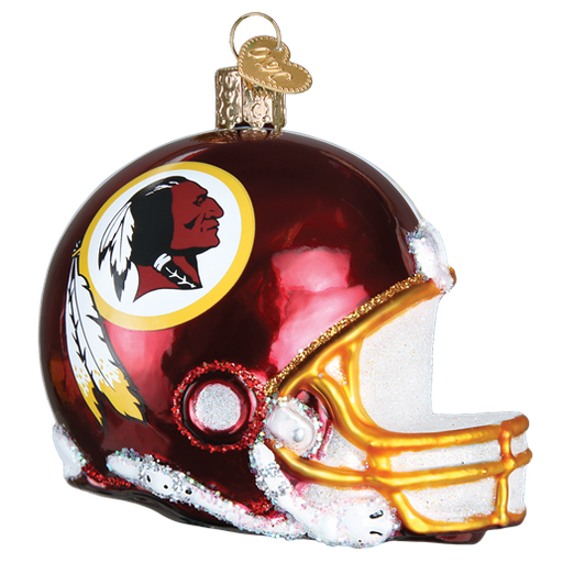 The Washington Helmet 73217 Old World Christmas Ornament is shaped like a Washington helmet, featuring a red design embellished with yellow and white details and showcasing a logo with a feathered headdress.