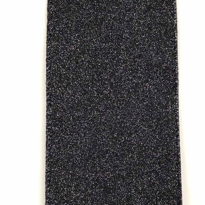 A close-up of a 2.5 Black Glitter Ribbon, rectangular in shape with a gritty, sparkling texture reminiscent of black sandpaper, set against a white background.