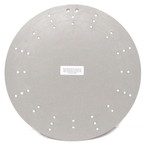 The 15.5 Plastic Character Wreath Form is a round, flat, gray disc with multiple small holes in circular patterns. A center white label provides detail against the plain white background, showcasing its simple elegance.
