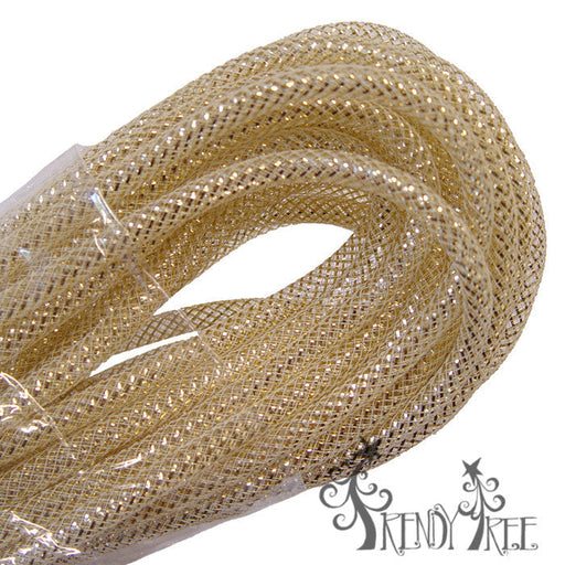The Deco Flex Tubing Cream with 18K Gold Metallic Foil, a coiled metallic mesh ribbon, is showcased on a white backdrop with loops and a net-like texture. The Trendy Tree brand logo appears in the bottom right corner.