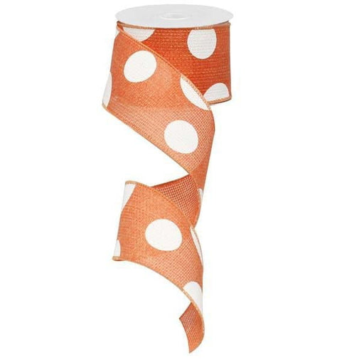 The partially unwound 2.5 Giant Multi Dot Salmon White Ribbon (RG0120094) is shown on a plain white background, featuring vibrant orange with charming white polka dots.