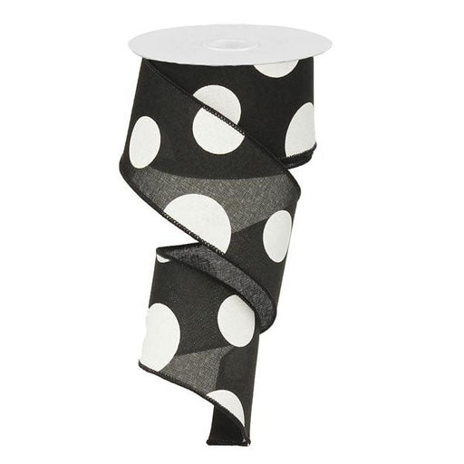 The 2.5 Large Multi Dot Black White Ribbon RX9143X6 features black polyester with large white polka dots, partially unwound and twisted, adding a playful touch to any project.