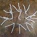 The Work Table Piece White 15 XX747827 features an oval white metal frame on a brown tiled floor, accented with twisted white pipe cleaners spread like spider legs—a striking and unique decorative work table accessory.