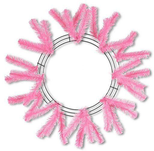 The 24 Work Wreath Pink XX748822 features pink artificial tinsel branches attached to a round metal frame, creating a vibrant and elegant festive decoration against a white background.